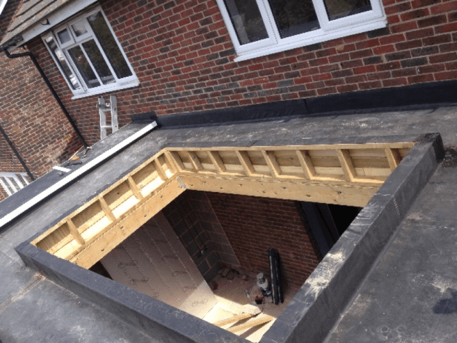 How Do You Maintain A Flat Roof On A House